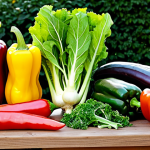 **

"A vibrant and diverse selection of fresh, colorful vegetables arranged on a wooden table, showcasing a healthy meal. The vegetables include leafy greens, root vegetables, and bell peppers. In the background, a home garden is visible. Safe for work, appropriate content, fully clothed, professional, modest, family-friendly, perfect anatomy, correct proportions, natural pose, well-formed hands, proper finger count, natural body proportions."

**